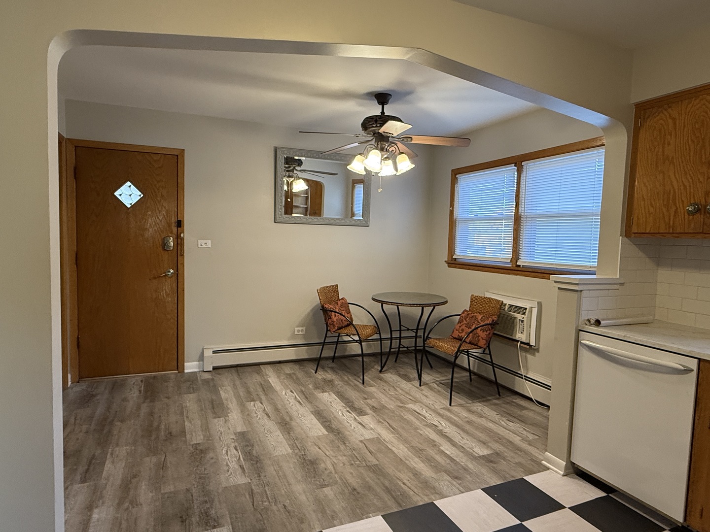 5736 West Gunnison Street, Unit 2 Chicago, IL 60630 - Photo 4 of 17 a view of a livingroom with furniture and a ceiling fan