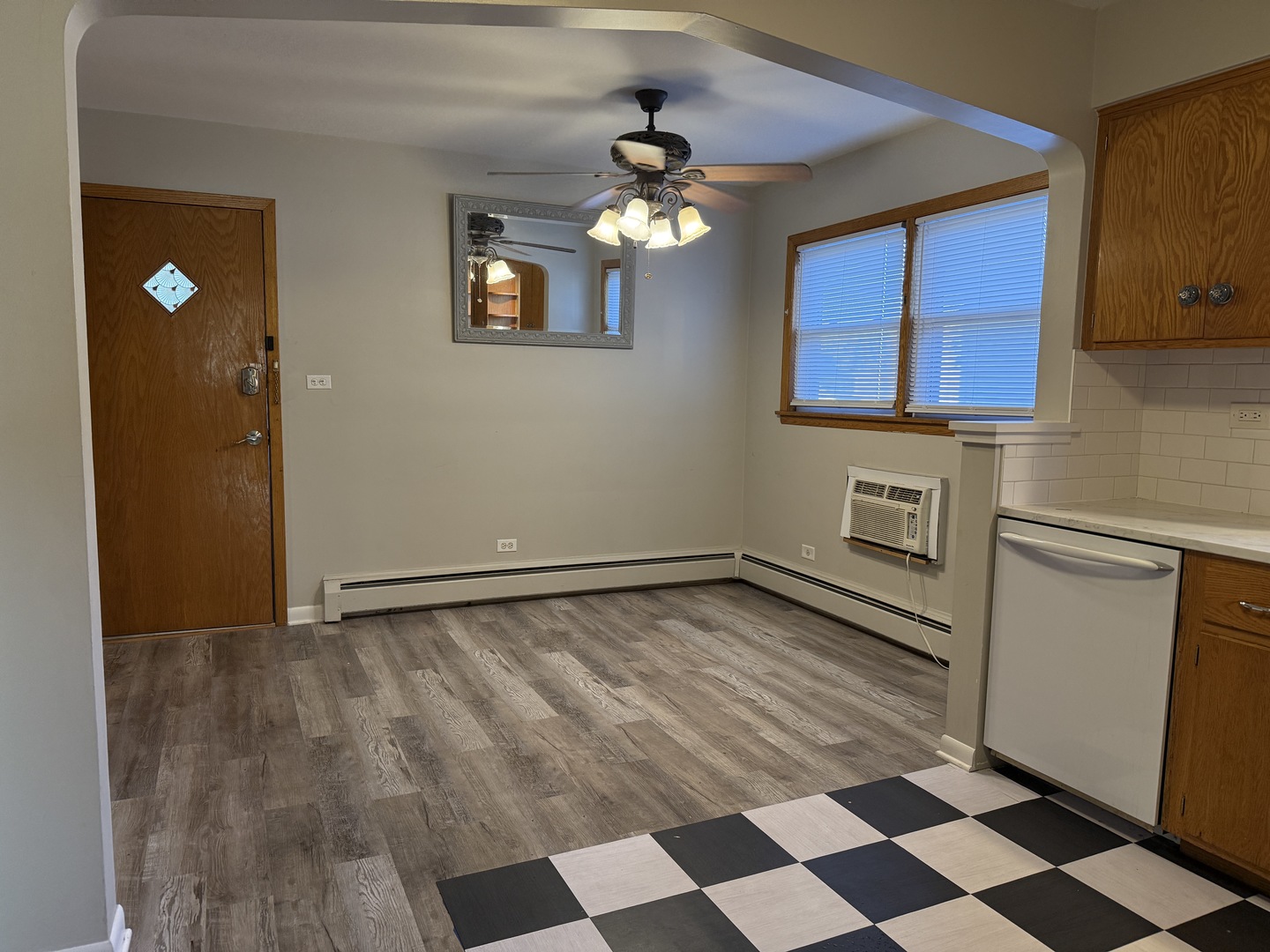 5736 West Gunnison Street, Unit 2 Chicago, IL 60630 - Photo 8 of 17 a view of a kitchen with a sink and cabinets