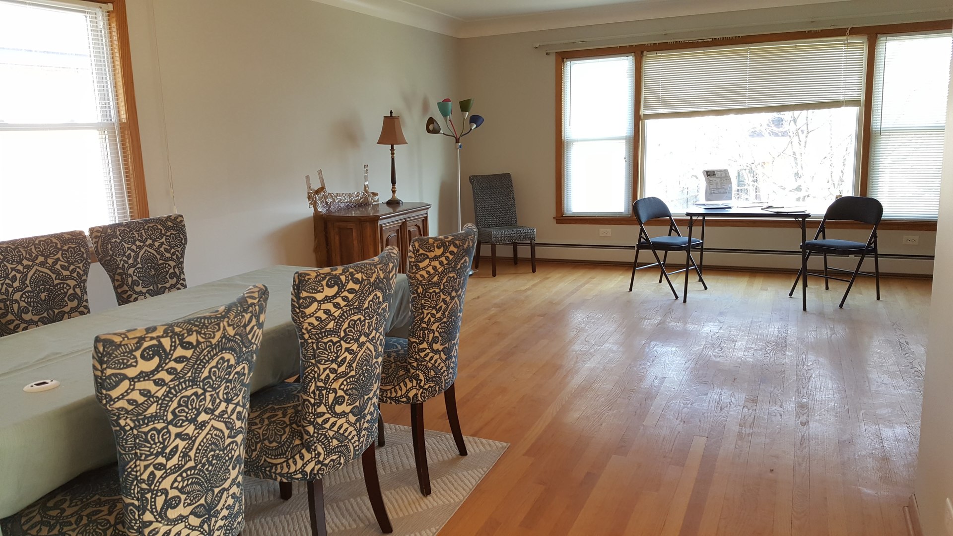 5736 West Gunnison Street, Unit 2 Chicago, IL 60630 - Photo 9 of 17 a view of a livingroom with furniture and a window