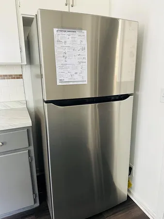 a view of walk in closet with window