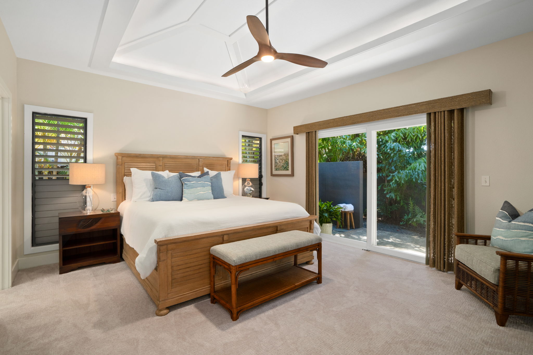 1753 Kelaukia Street Koloa, HI 96756 - Photo 16 of 27 a bedroom with a bed a lamp and window