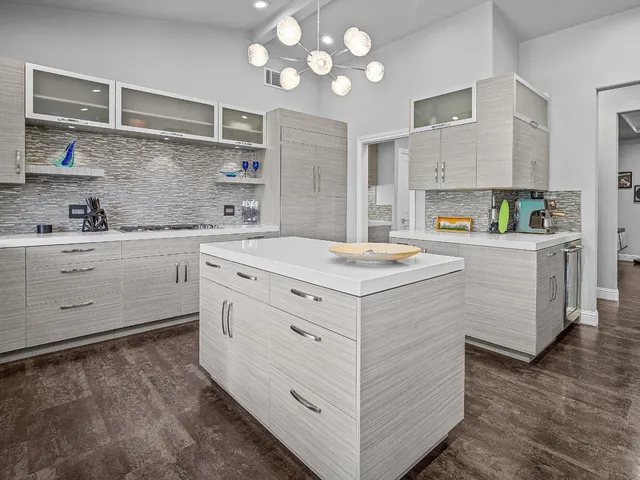 a kitchen with a sink and a window