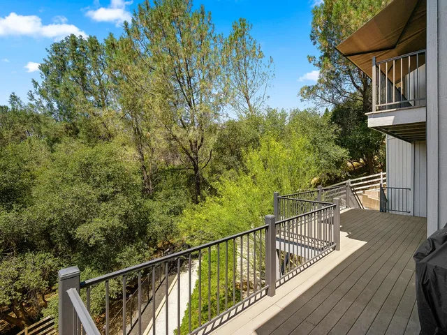 a view of barbeque area with seating area