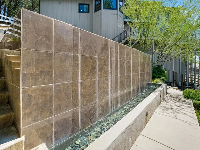 a view of a balcony with furniture