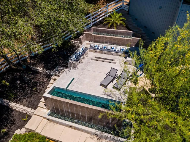 a patio with table and chairs