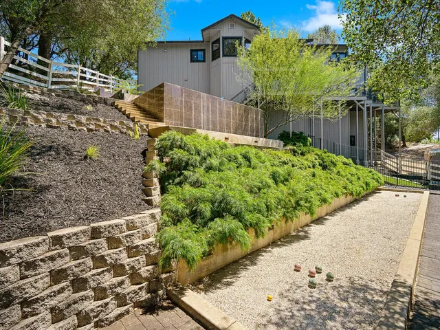 a view of balcony and yard