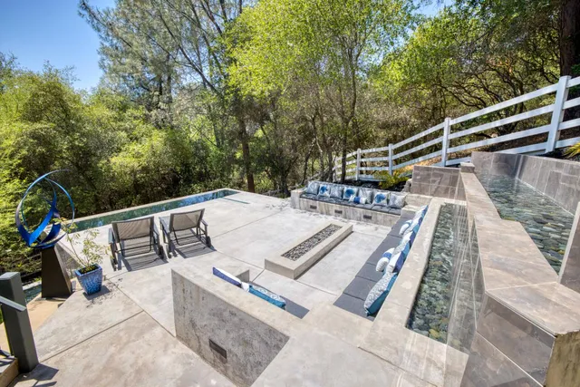 a front view of a house with car parked