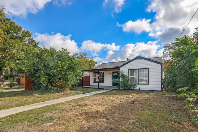 a view of house with outdoor space