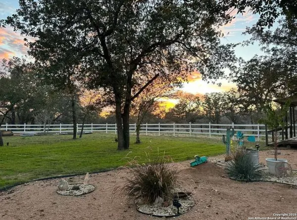a view of a park with swings