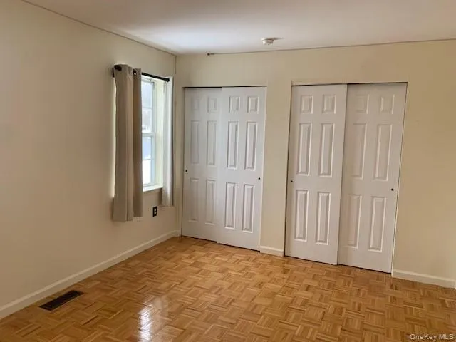 an empty room with window