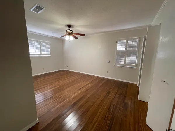 a bathroom with a sink a mirror and a bathtub
