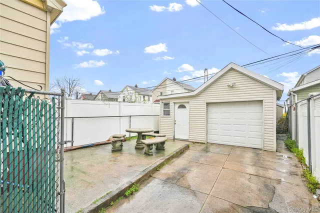 a view of a patio with couches chairs and potted plants