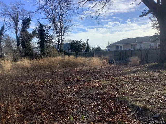 a view of a backyard of a house