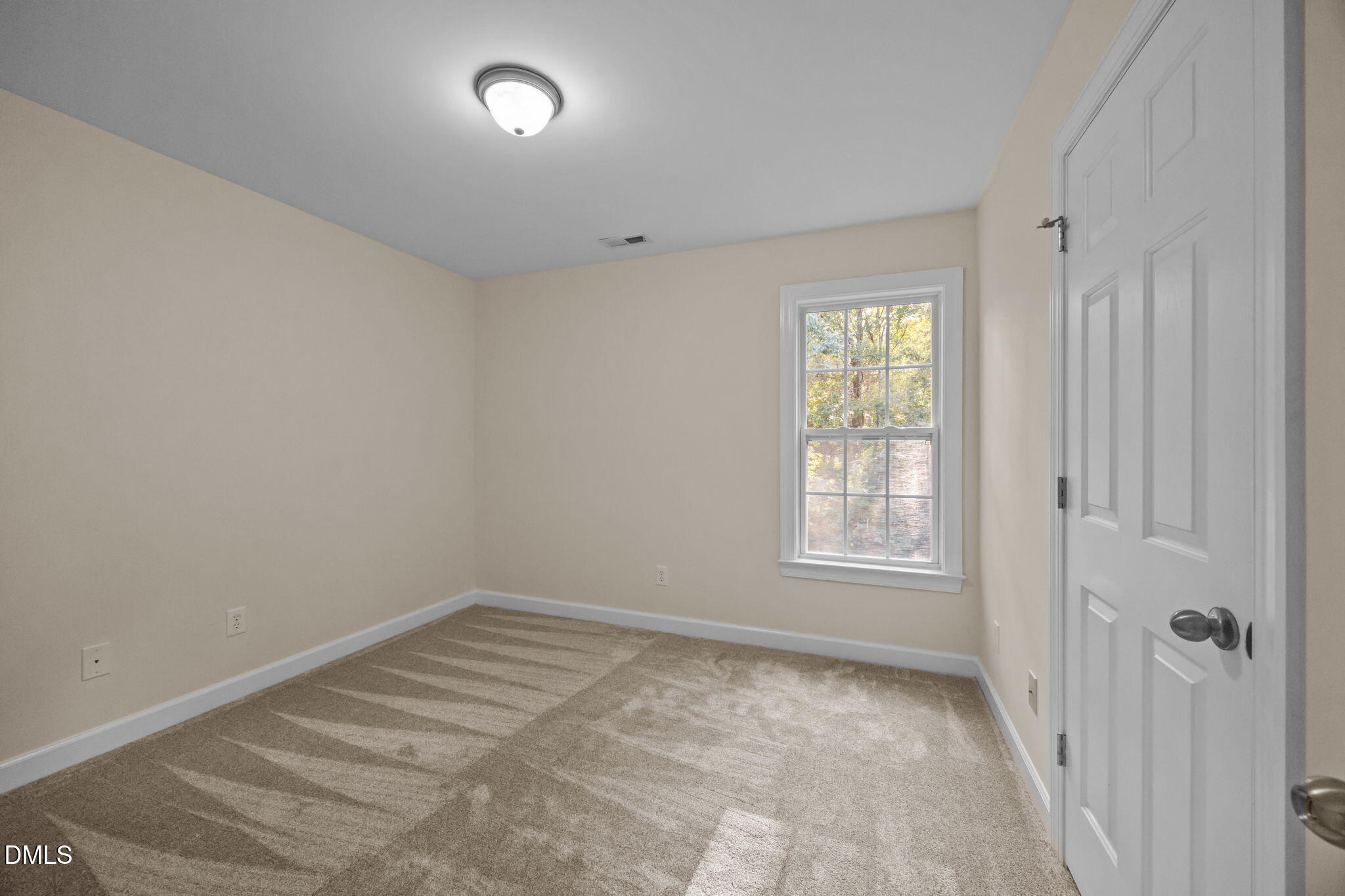 505 Vinson Road Clayton, NC 27527 - Photo 22 of 31 a view of empty room with windows
