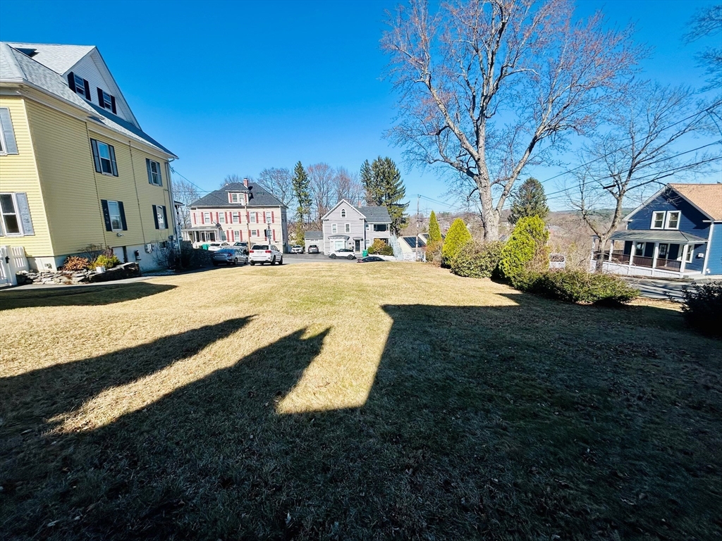 5 Richman Street Clinton, MA 01510 - Photo 4 of 4 a view of a street with houses