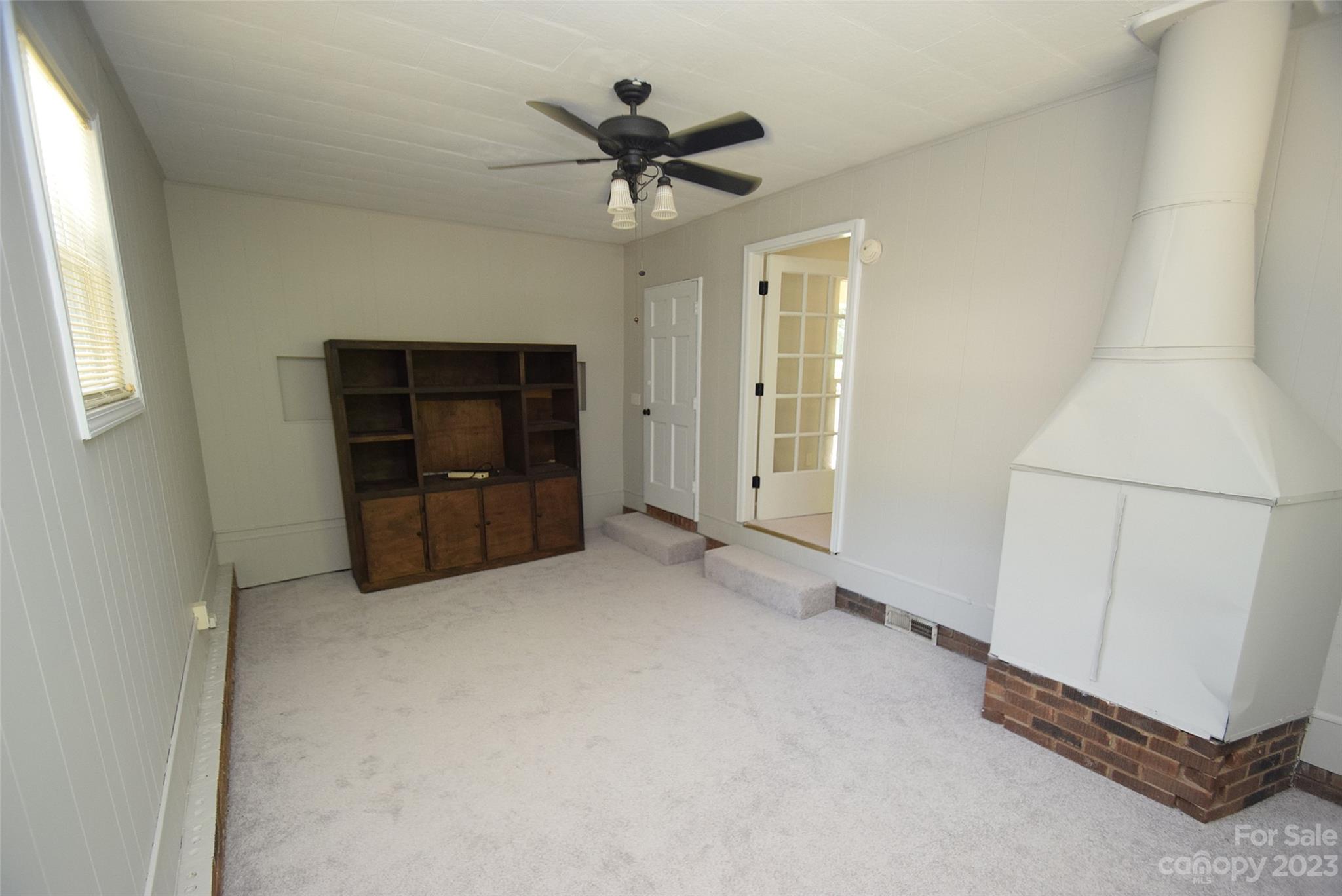 8429 Fieldwood Road Mint Hill, NC 28227 - Photo 14 of 28 an empty room with closet and ceiling fan