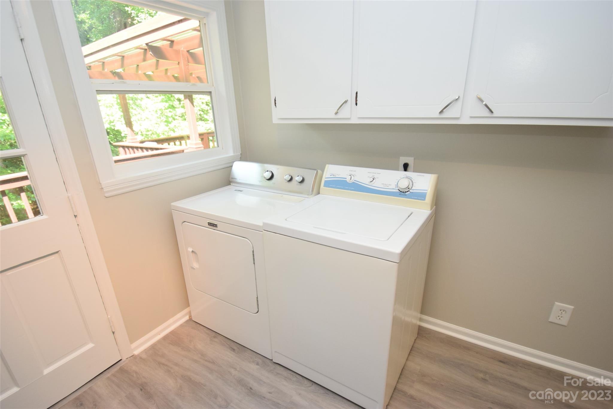 8429 Fieldwood Road Mint Hill, NC 28227 - Photo 17 of 28 a view of utility room with washer and dryer