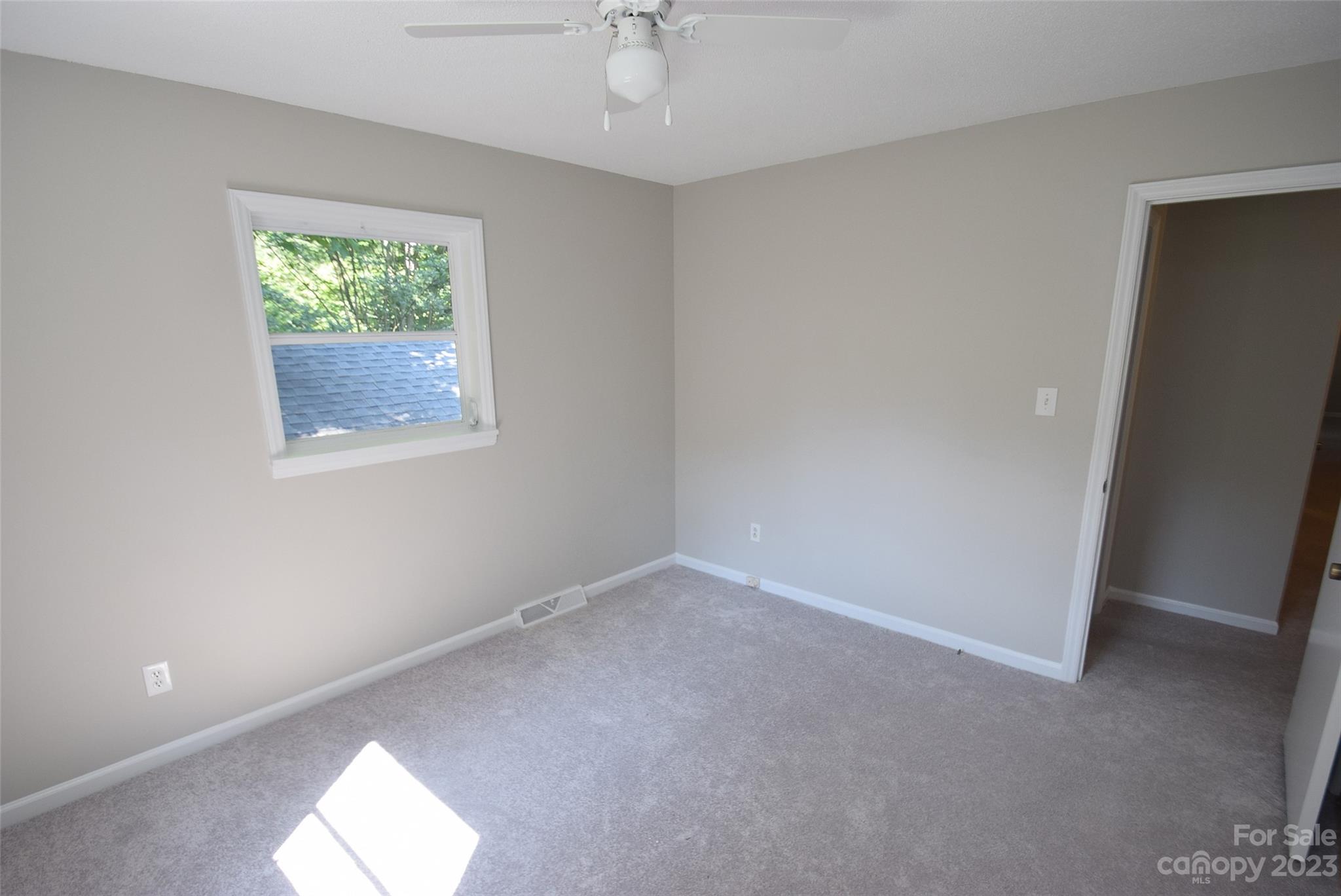8429 Fieldwood Road Mint Hill, NC 28227 - Photo 24 of 28 an empty room with windows and closet
