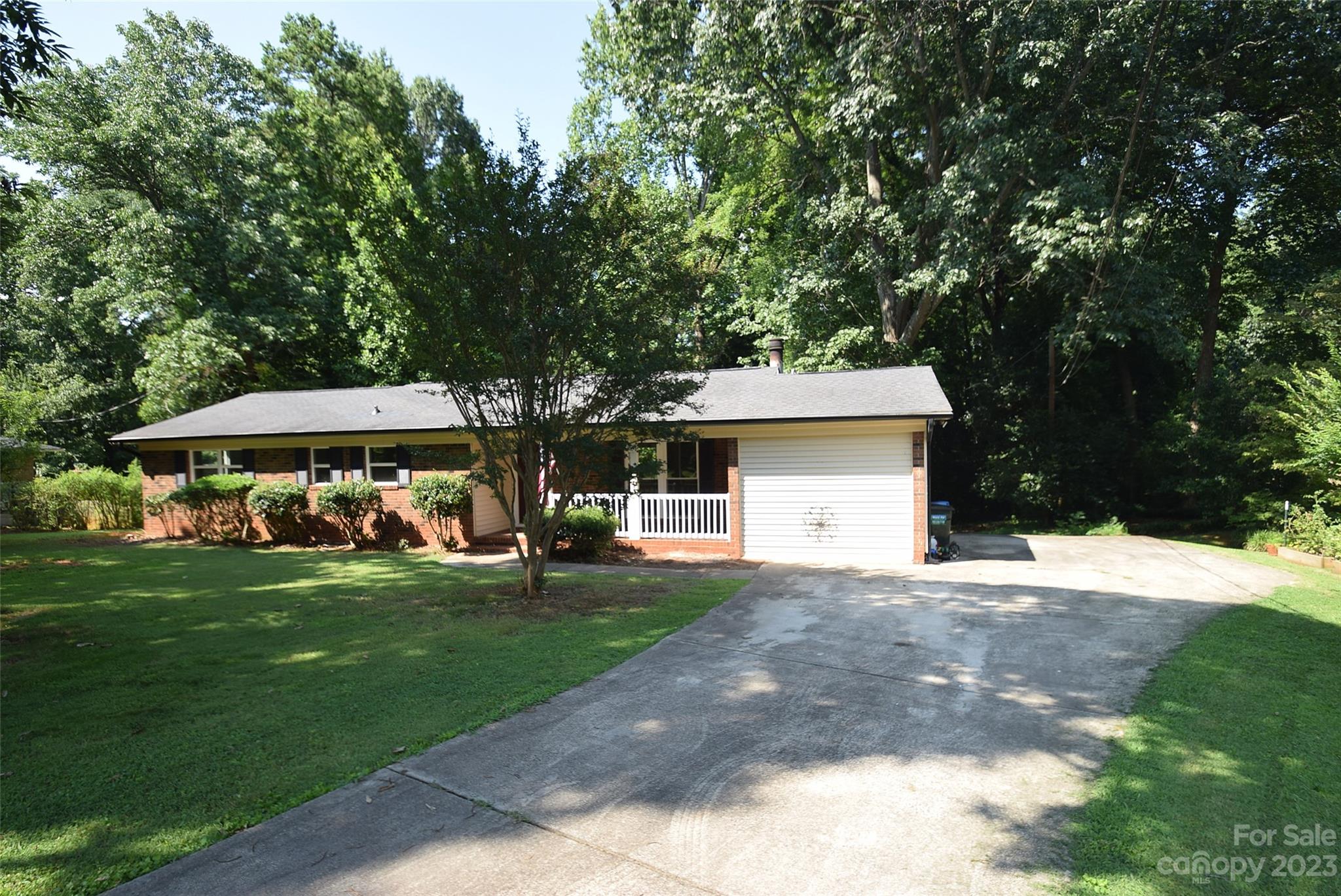 8429 Fieldwood Road Mint Hill, NC 28227 - Photo 3 of 28 a view of a house with a yard and tree s