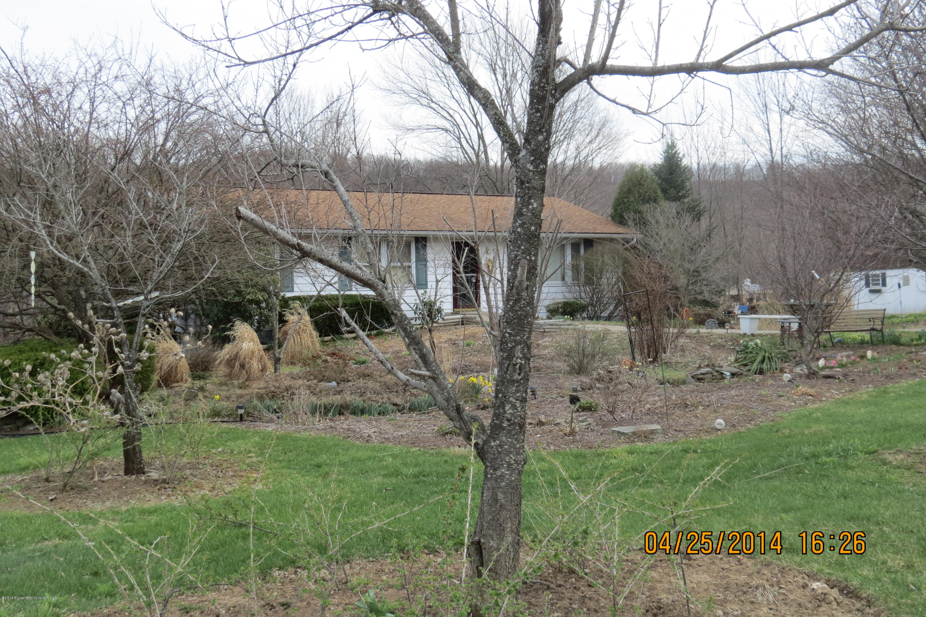 5300 Jubilee Road Moscow, PA 18444 - Photo 1 of 10 a view of a house with a yard