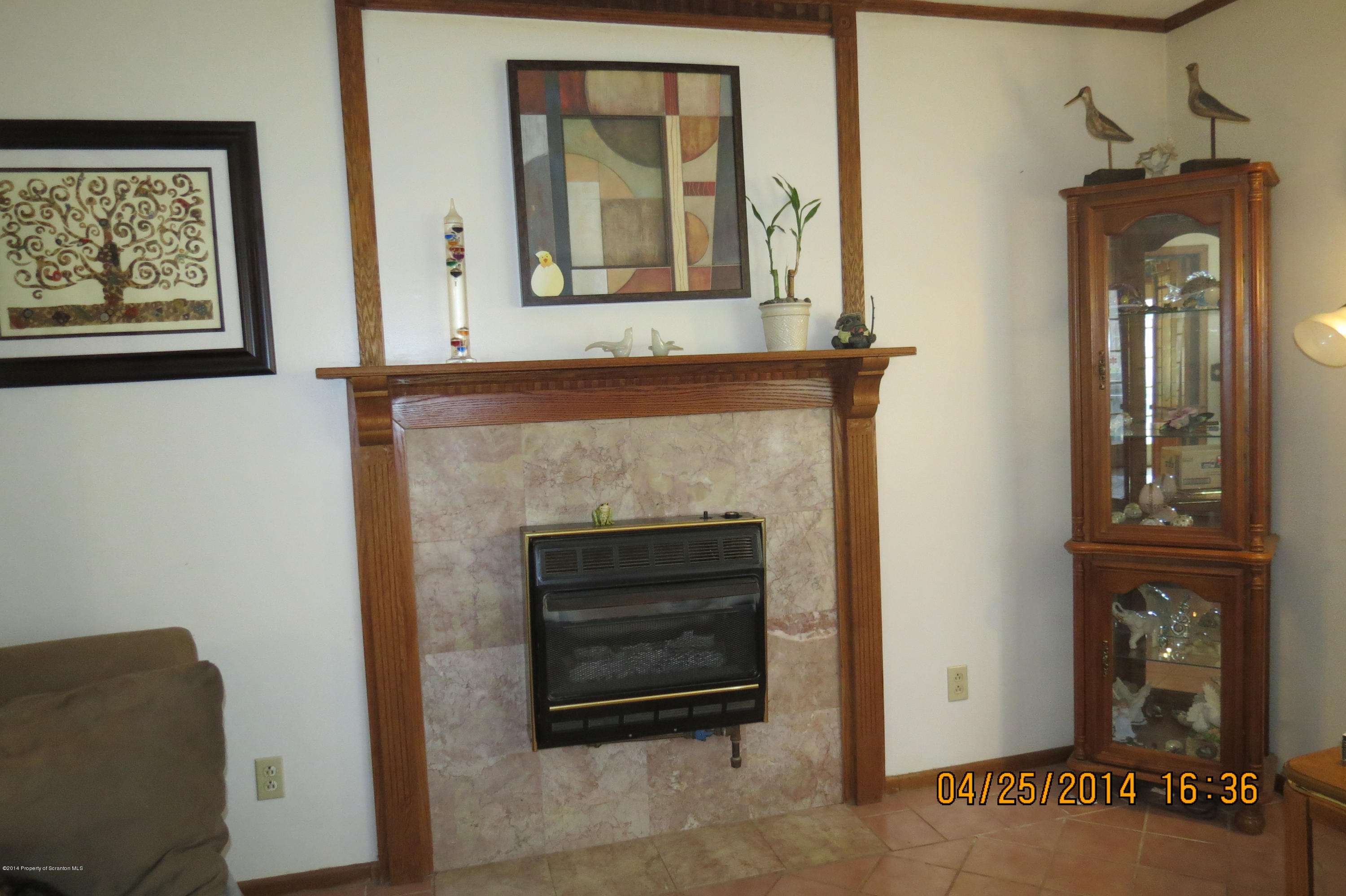 5300 Jubilee Road Moscow, PA 18444 - Photo 5 of 10 a view of livingroom with furniture and a fireplace