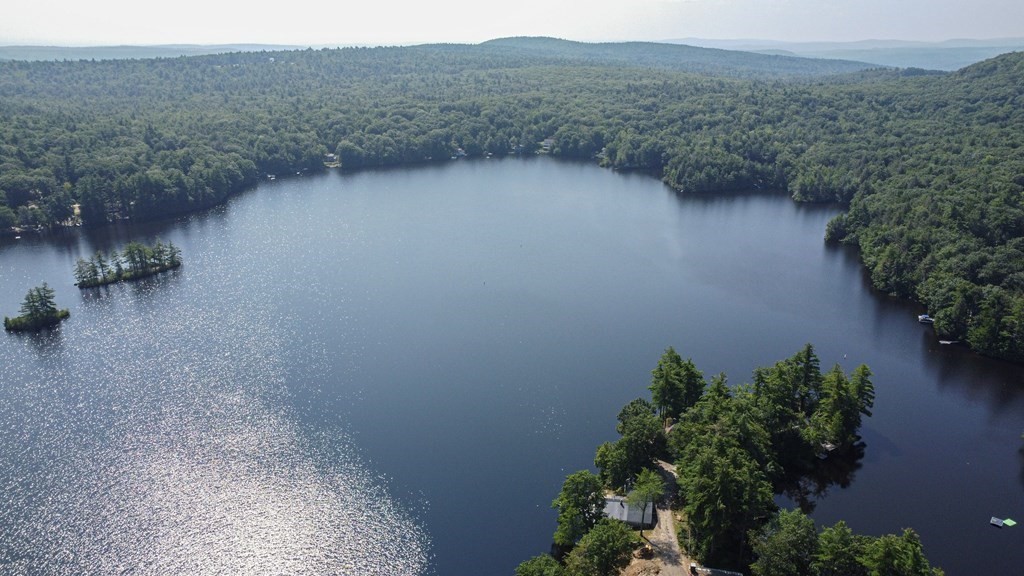 27 Hay Road Ashburnham, MA 01430 - Photo 17 of 42 a view of a lake with a mountain in the background