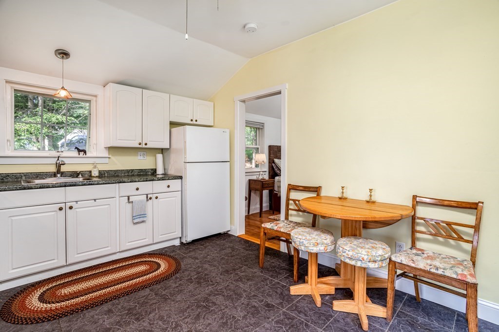 27 Hay Road Ashburnham, MA 01430 - Photo 20 of 42 a kitchen with stainless steel appliances a stove a sink and a refrigerator