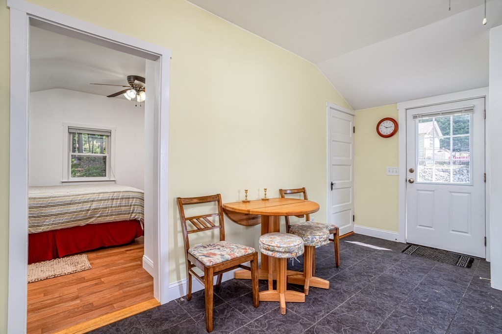 27 Hay Road Ashburnham, MA 01430 - Photo 21 of 42 a view of a dining room with furniture and wooden floor