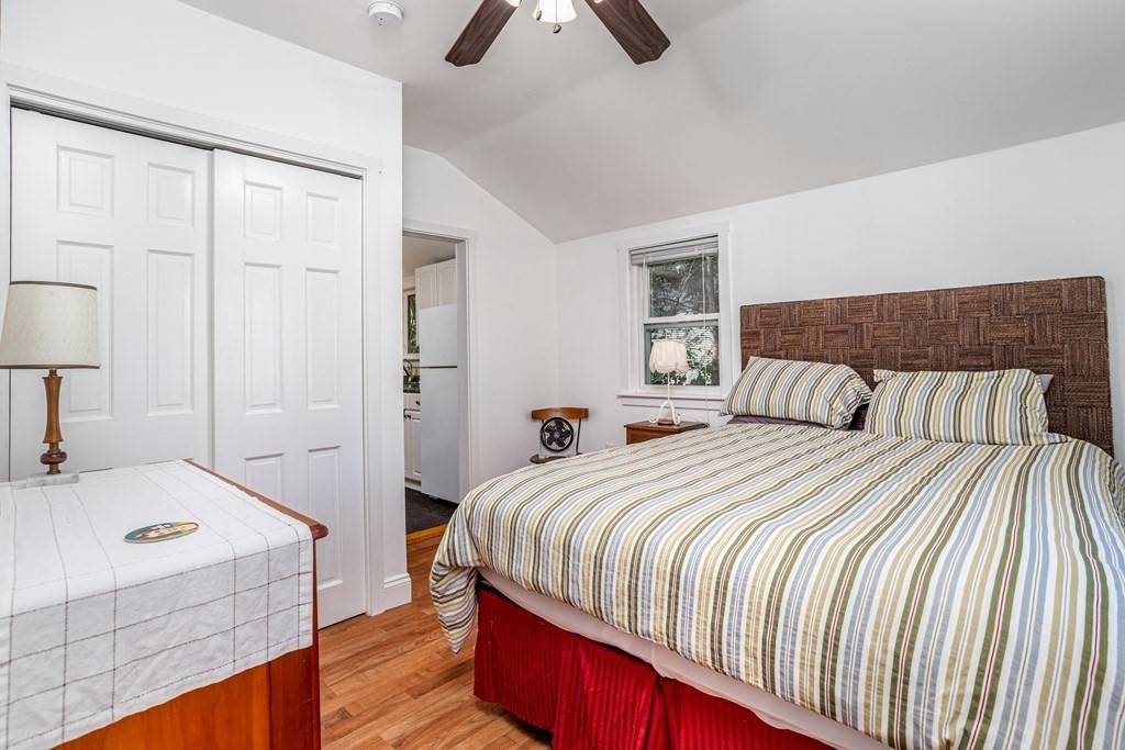 27 Hay Road Ashburnham, MA 01430 - Photo 27 of 42 a bedroom with a bed and wooden floor