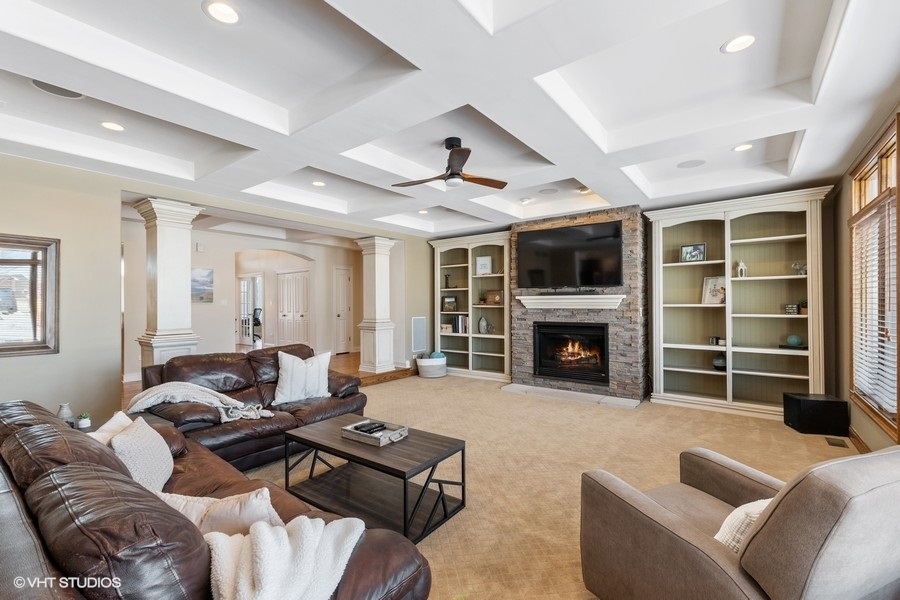 24042 Old Farm Road Manhattan, IL 60442 - Photo 11 of 32 a living room with furniture and a fireplace
