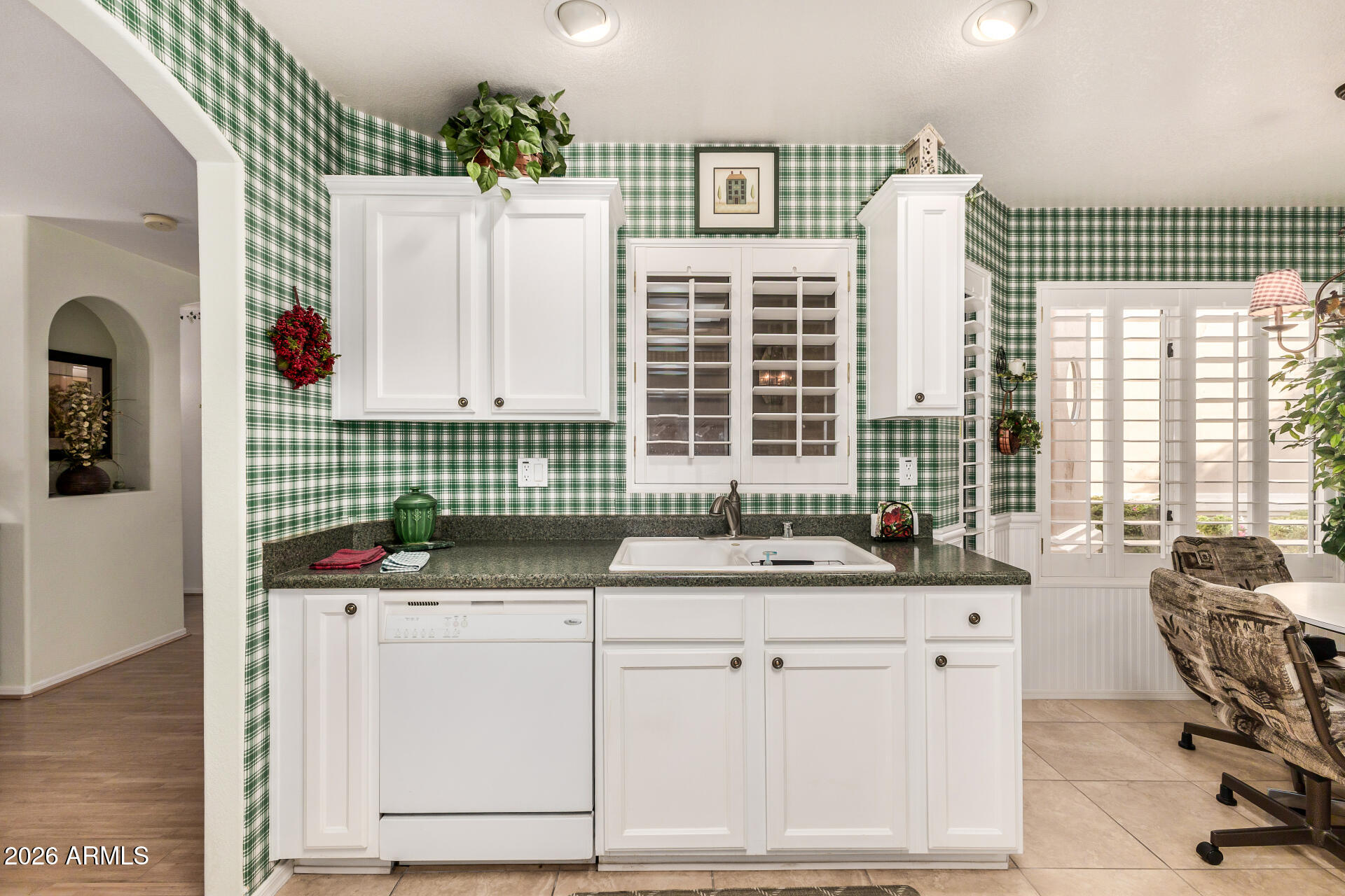 8508 West Utopia Road Peoria, AZ 85382 - Photo 11 of 28 a bathroom with a sink and a window
