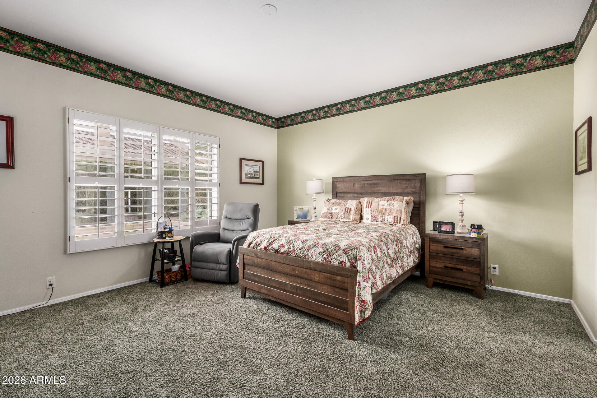 8508 West Utopia Road Peoria, AZ 85382 - Photo 15 of 28 a bedroom with a bed and a window