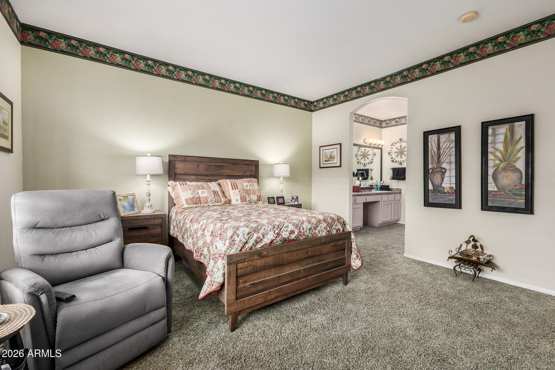 8508 West Utopia Road Peoria, AZ 85382 - Photo 16 of 28 a bedroom with a bed couch and a window