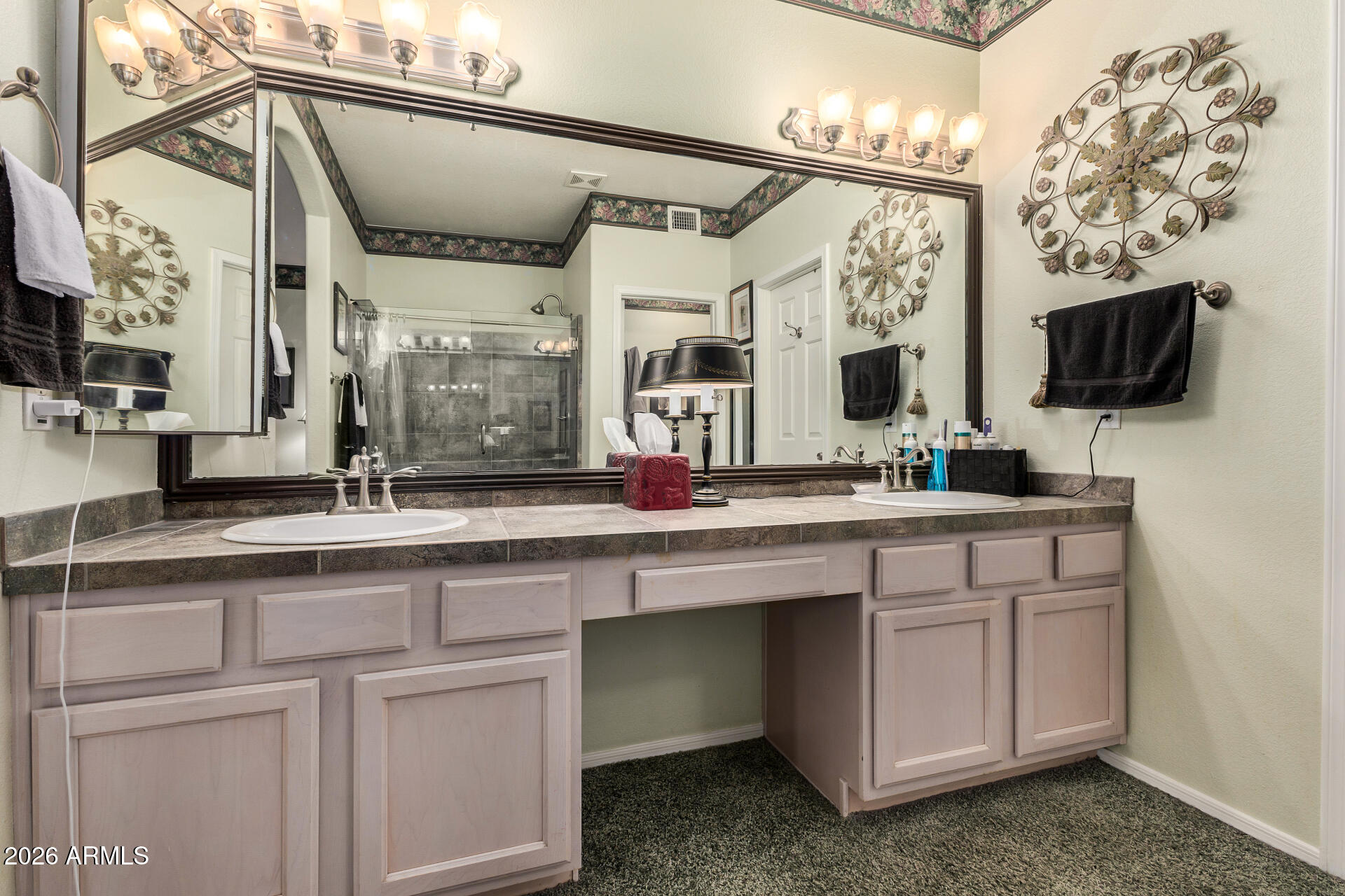 8508 West Utopia Road Peoria, AZ 85382 - Photo 19 of 28 a bathroom with a double vanity sink and mirror