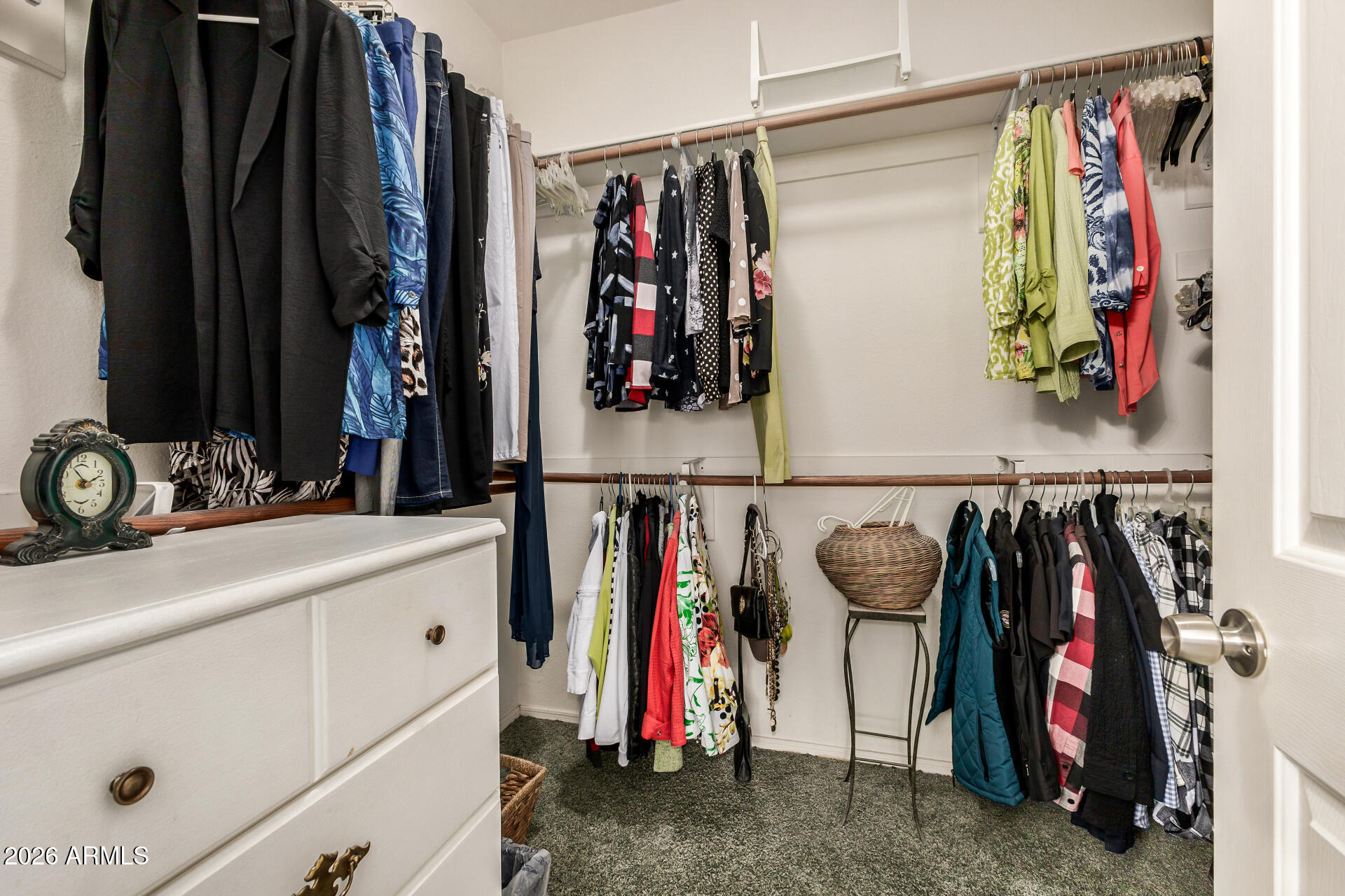 8508 West Utopia Road Peoria, AZ 85382 - Photo 20 of 28 a view of walk in closet with clothes