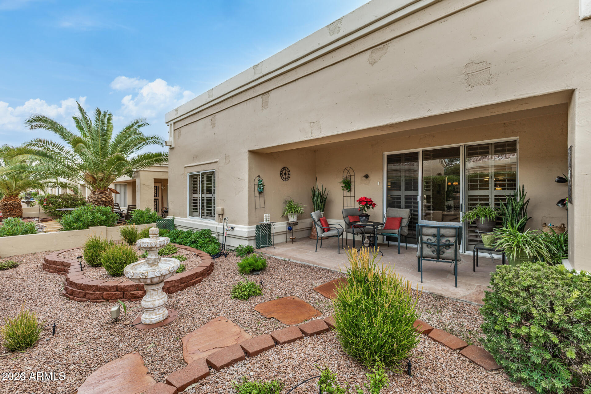 8508 West Utopia Road Peoria, AZ 85382 - Photo 27 of 28 a view of a backyard with garden and plants