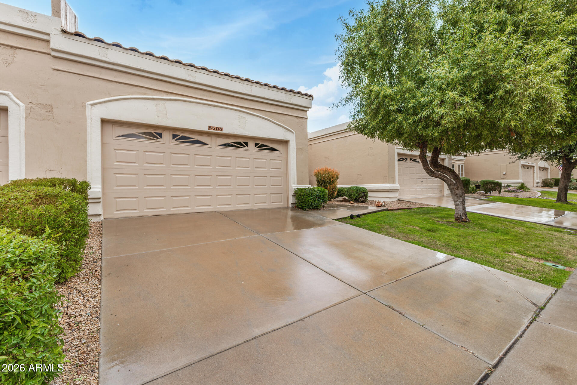 8508 West Utopia Road Peoria, AZ 85382 - Photo 3 of 28 a view of a house with a backyard