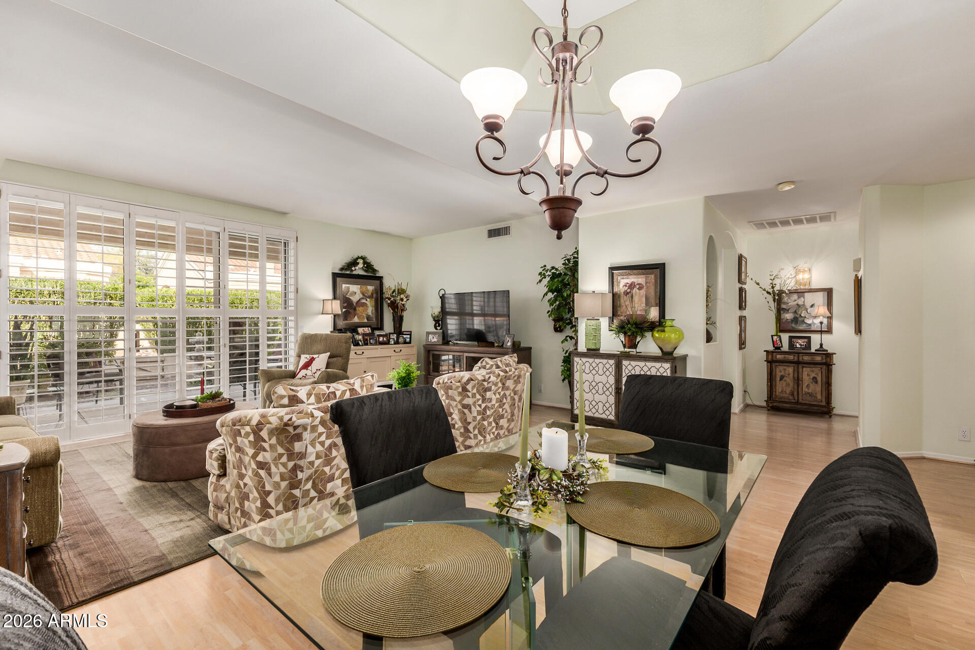 8508 West Utopia Road Peoria, AZ 85382 - Photo 8 of 28 a living room with fireplace furniture and a large window