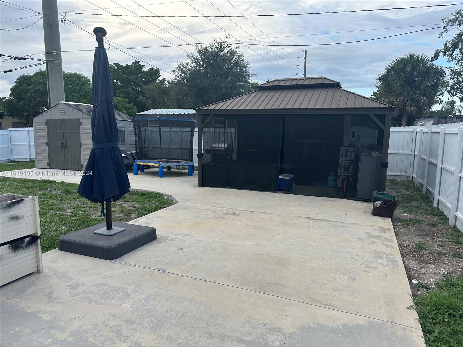 6791 Pershing Street Hollywood, FL 33024 - Photo 26 of 31 a house view with a garden space