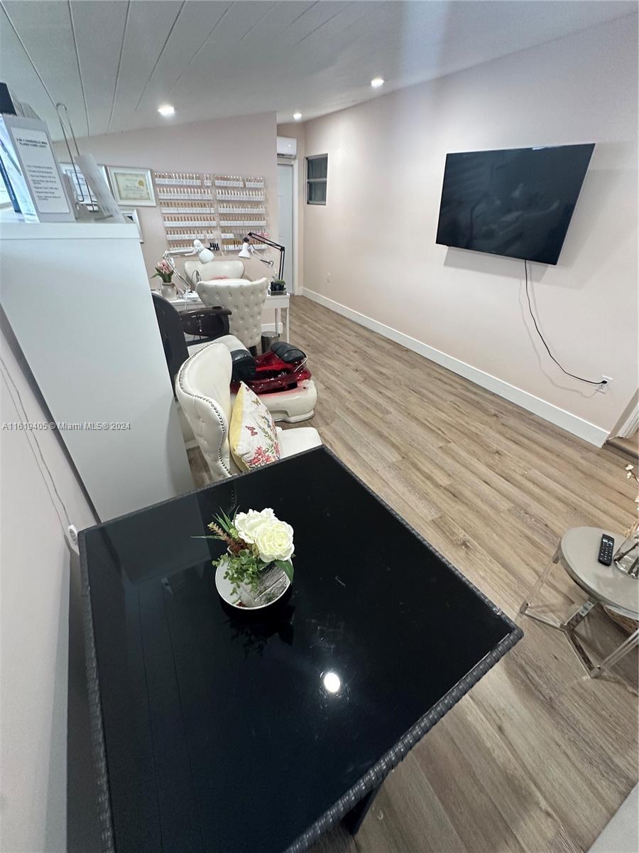 6791 Pershing Street Hollywood, FL 33024 - Photo 10 of 31 a living room with furniture and a rug