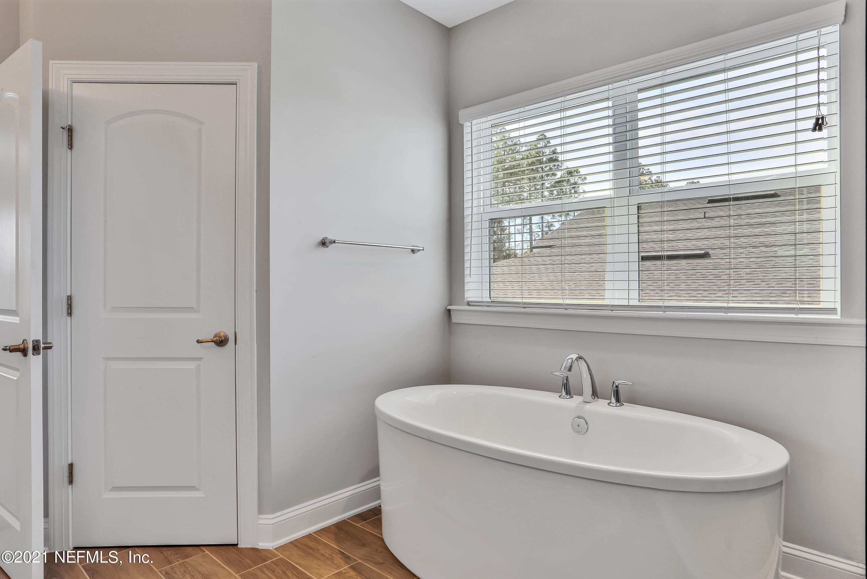 140 Pine Haven Drive St. Johns, FL 32259 - Photo 46 of 66 a white bath tub sitting next to a white sink