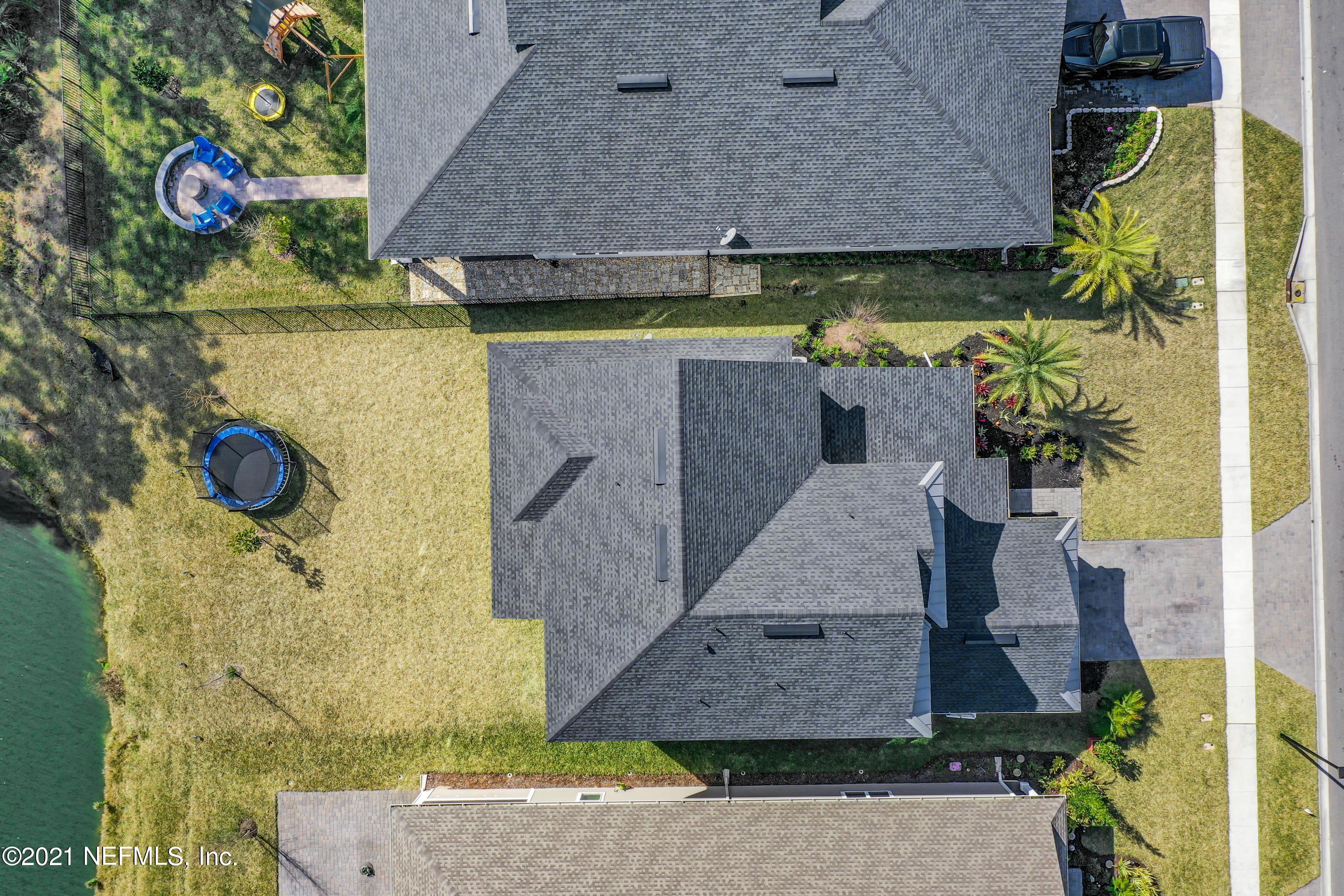 140 Pine Haven Drive St. Johns, FL 32259 - Photo 66 of 66 an aerial view of a house with a swimming pool