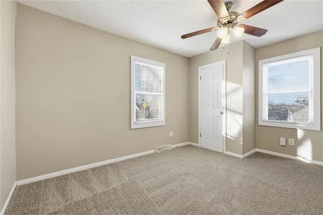 $215,000 | 7867 James A Reed Road, Kansas City, MO 64138