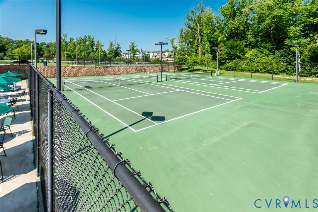 5149 Lake Summer Loop Moseley, VA 23120 - Photo 8 of 12 a view of a tennis court