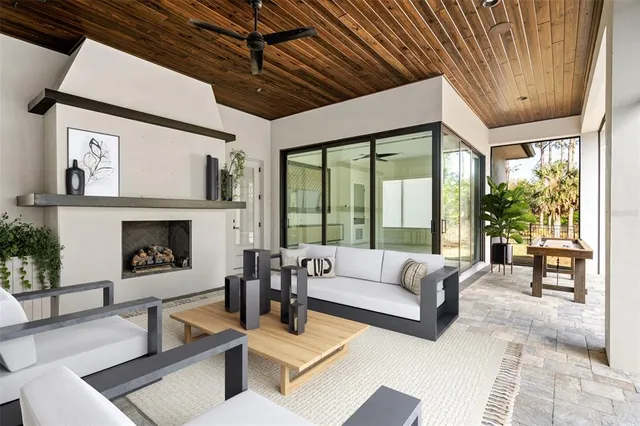 a kitchen with stainless steel appliances a stove a sink and a refrigerator