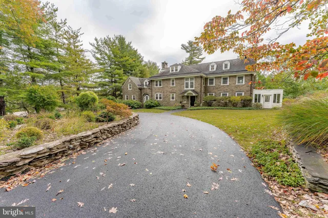 a bathroom with a sink toilet and mirror