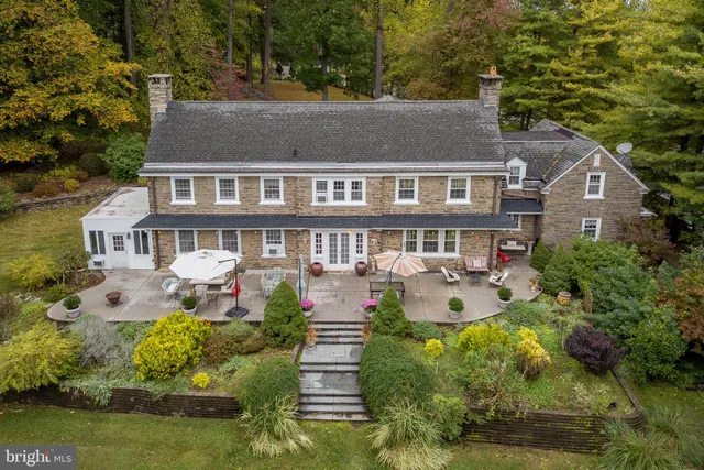 a view of a dining room with furniture wooden floor and chandelier