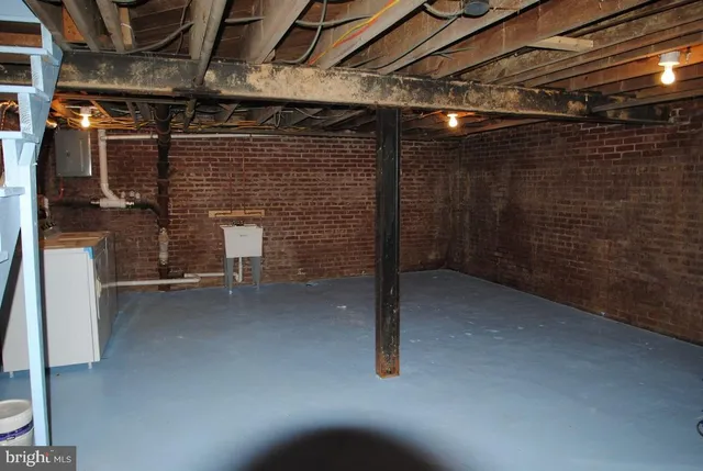 a view of empty room with stairs