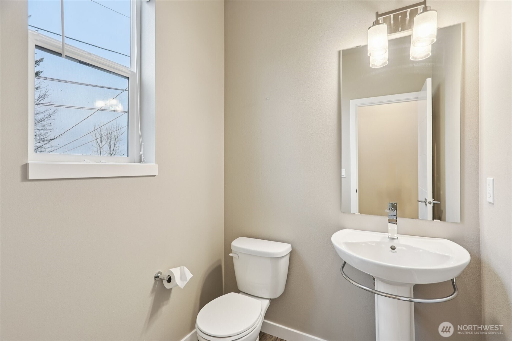 13724 Ash Way, Unit F3 Everett, WA 98204 - Photo 13 of 28 a bathroom with a toilet a sink and a mirror