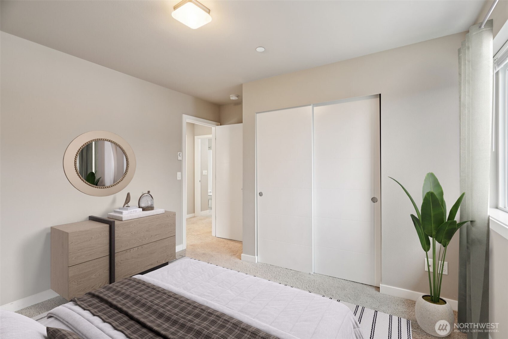 13724 Ash Way, Unit F3 Everett, WA 98204 - Photo 14 of 28 a living room with furniture and a potted plant